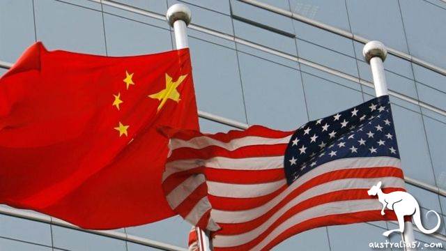 Flags of China (left) and the US. File photo